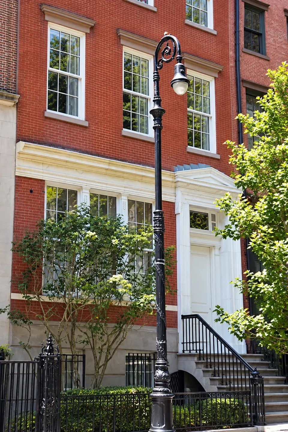 The classical entrance surround and stoop of 23 Gramercy Park South.