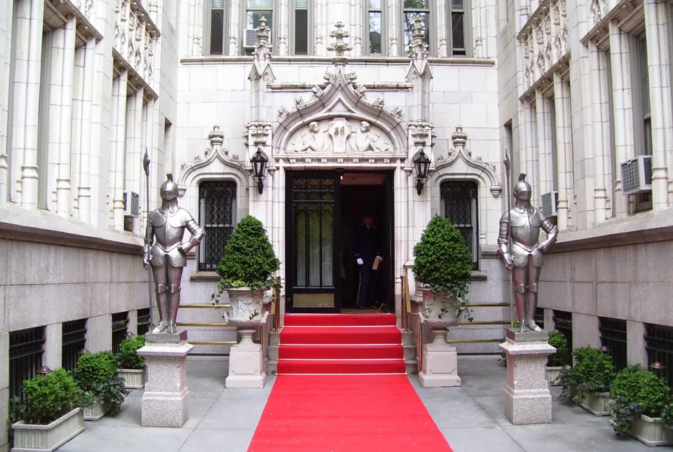 Two armored knights flank the entrance court and red-carpeted steps of 36 Gramercy Park East.