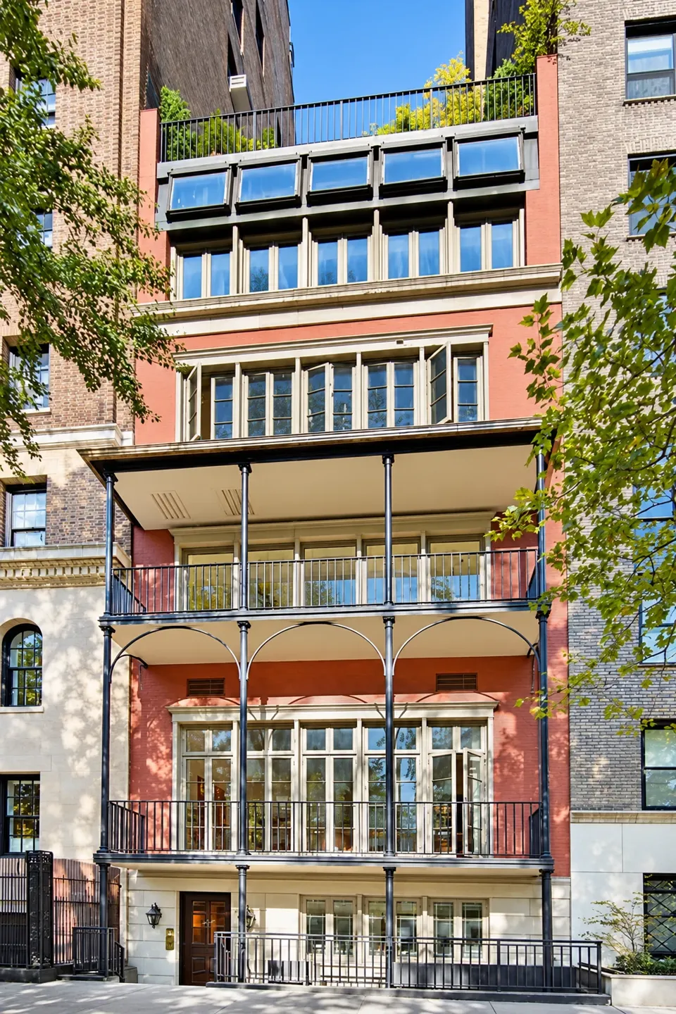 48 Gramercy Park North: the narrow façade, iron verandas, and upper stories.