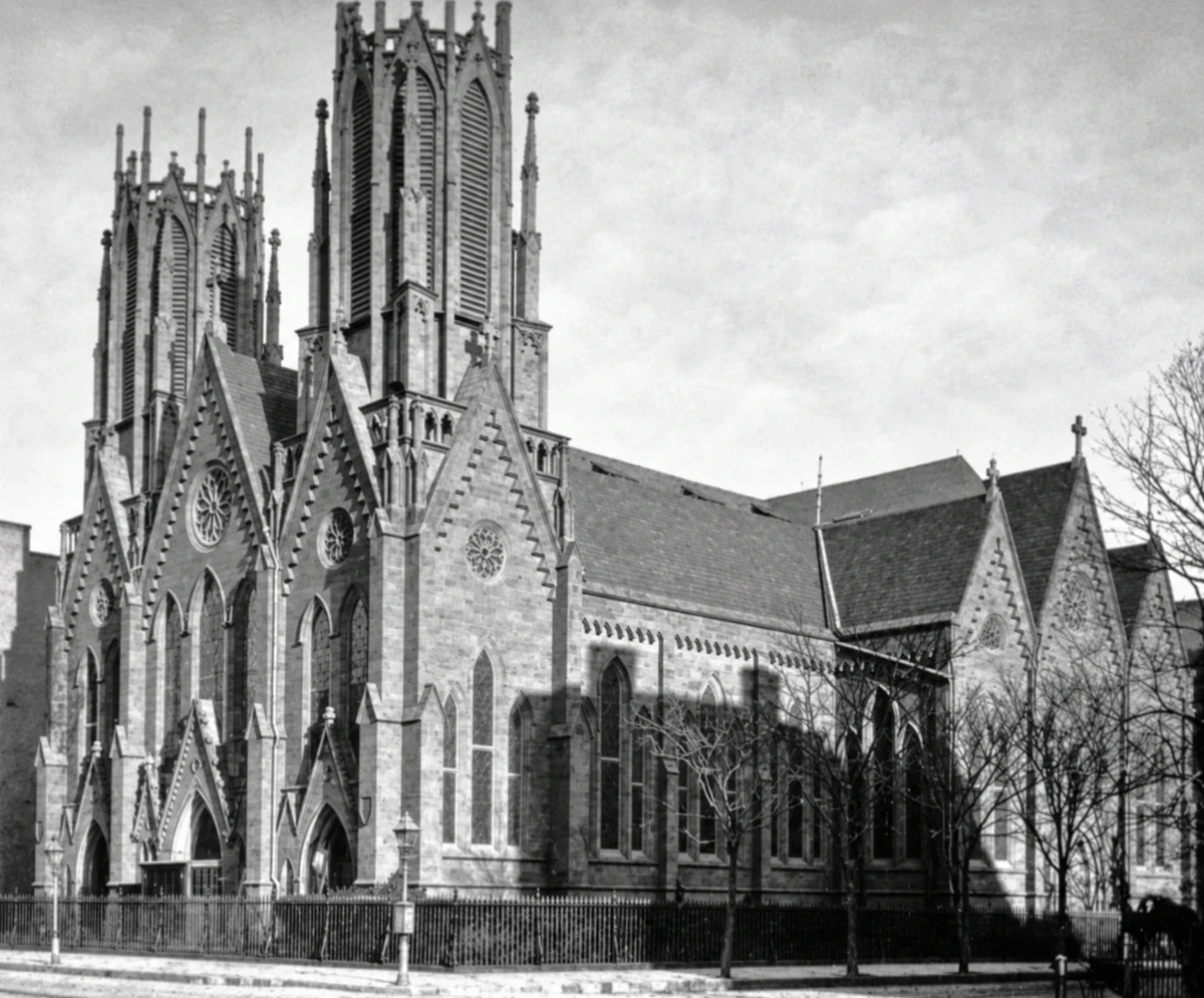 Calvary Church’s Gothic façade and two original octagonal towers in a historic photograph.