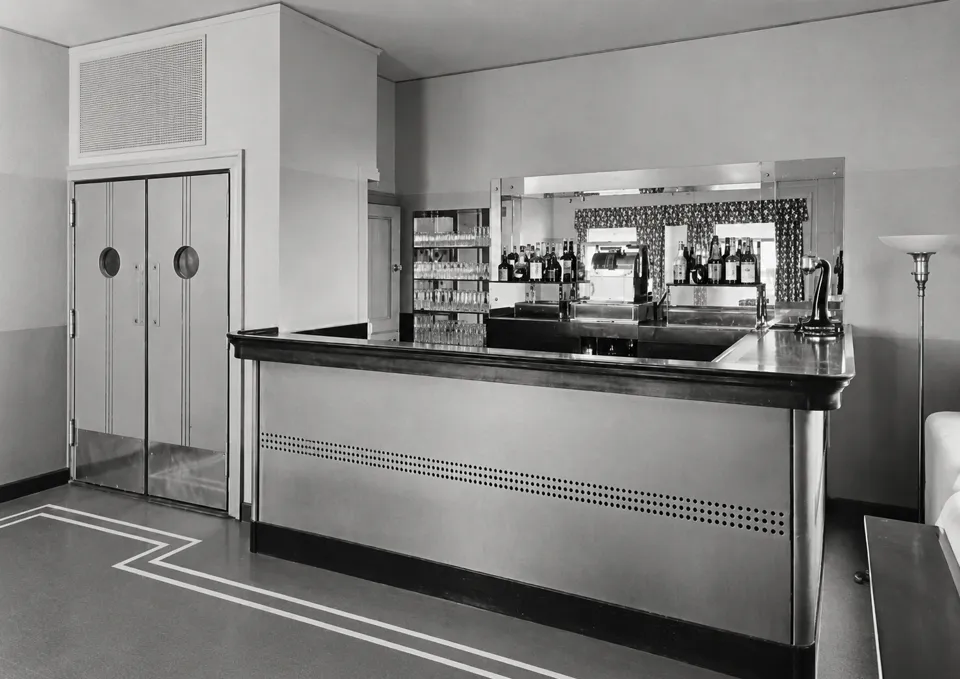 The eighteenth-floor bar, photographed on June 26, 1941. Its curved counter and circular door windows offer a very different view of hotel life from the later Rose Bar.