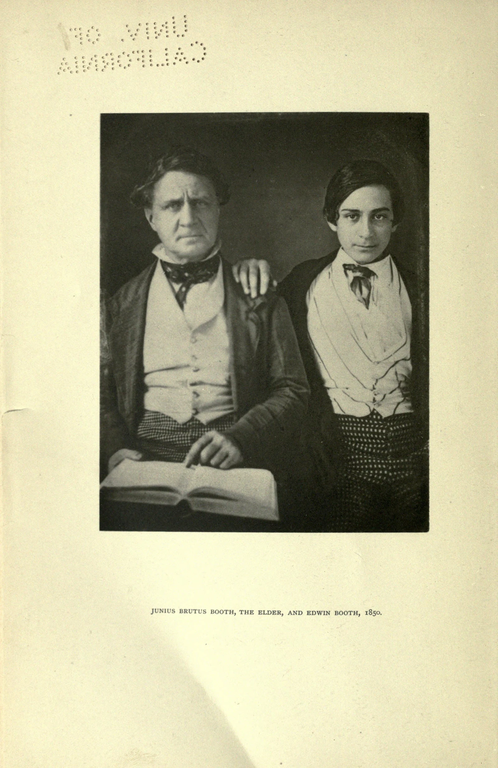 Junius Brutus Booth seated with the young Edwin standing beside him, an arm around his father.