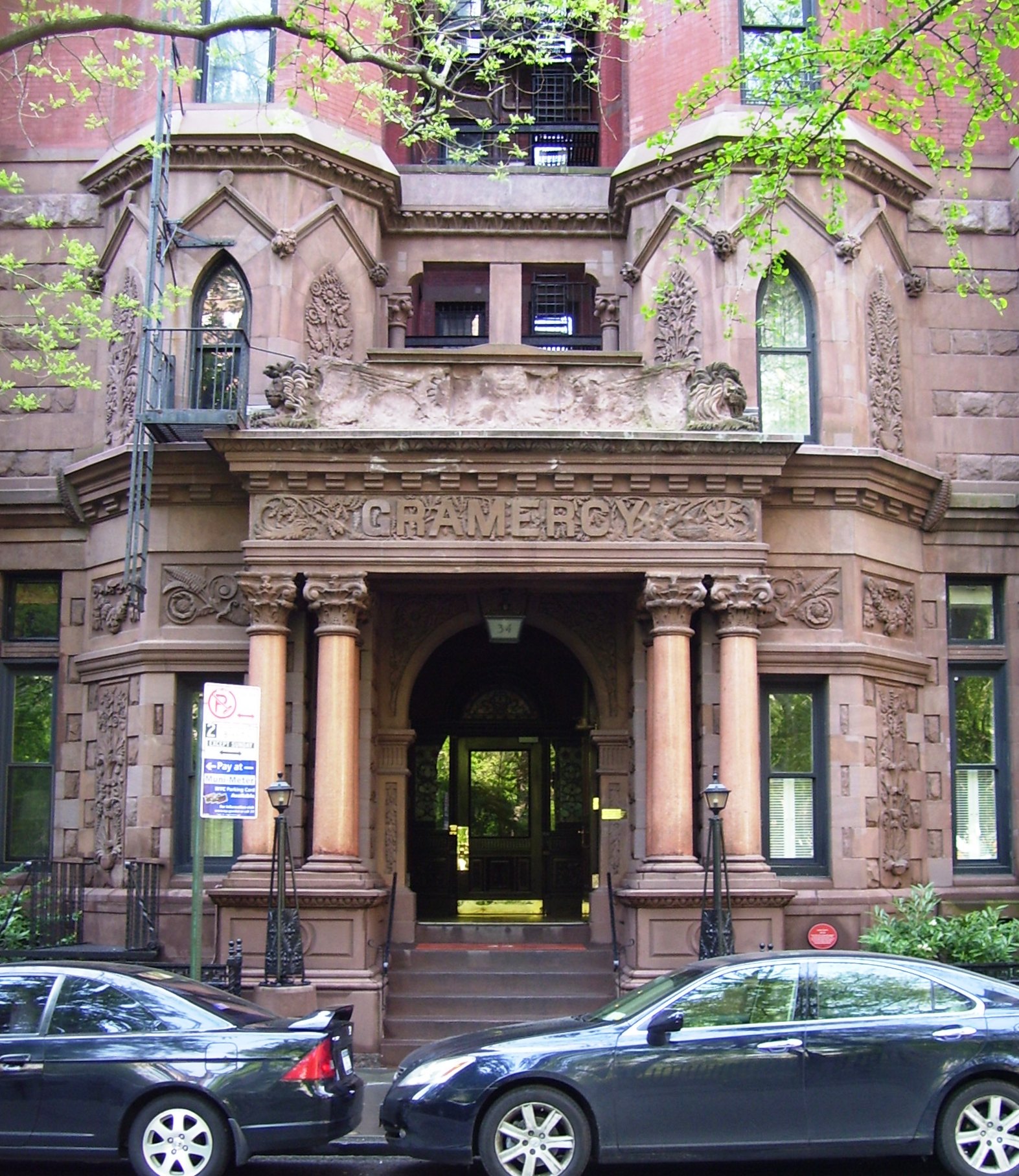 The porch with granite columns, carved capitals, GRAMERCY lettering and winged lions