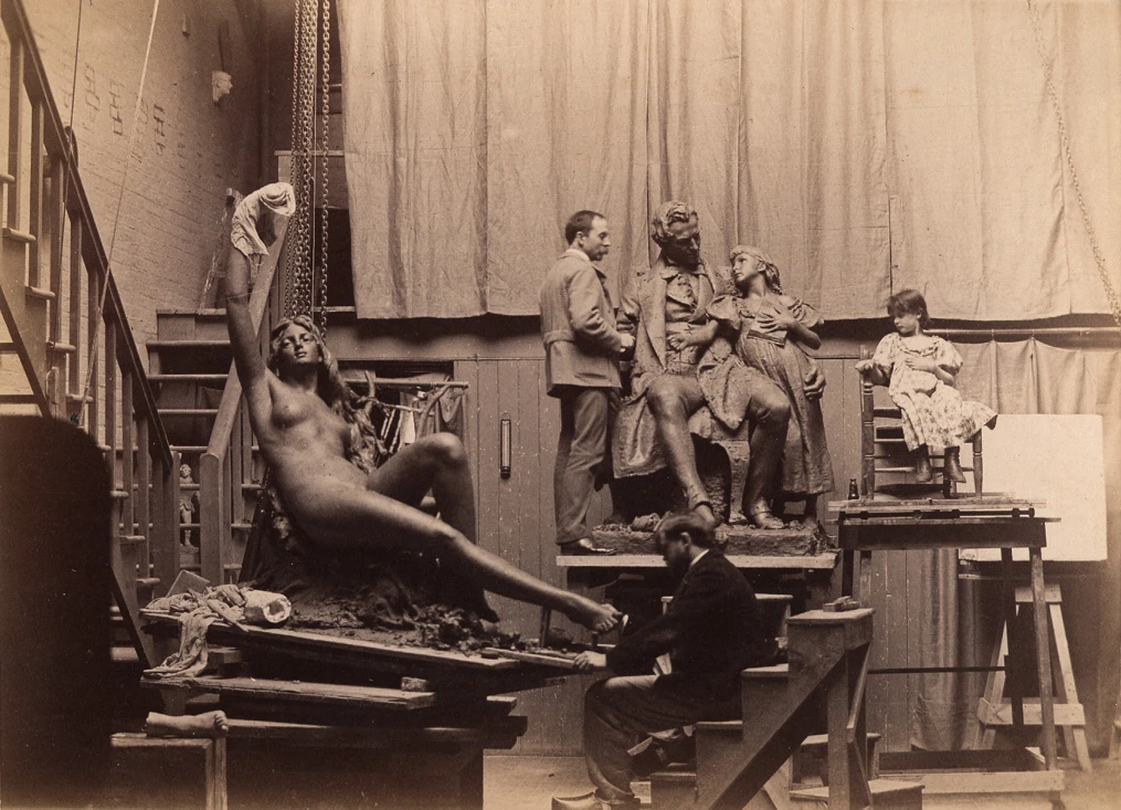 Daniel Chester French at work among sculptures in his New York studio, circa 1889.