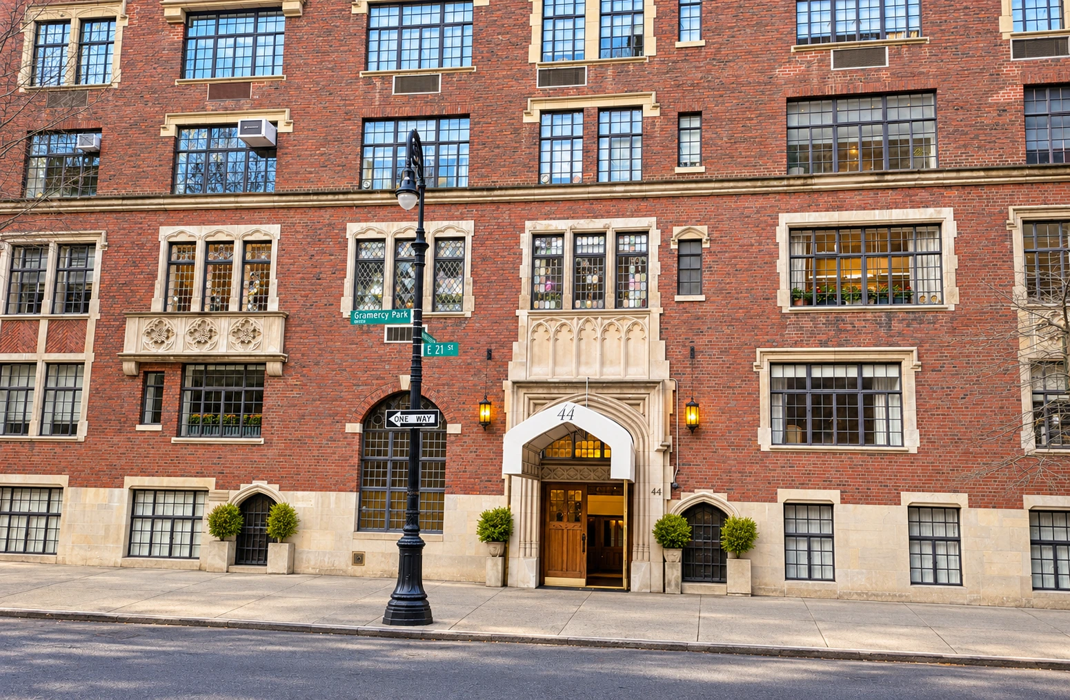 The limestone entrance and varied windows of 44 Gramercy Park North.