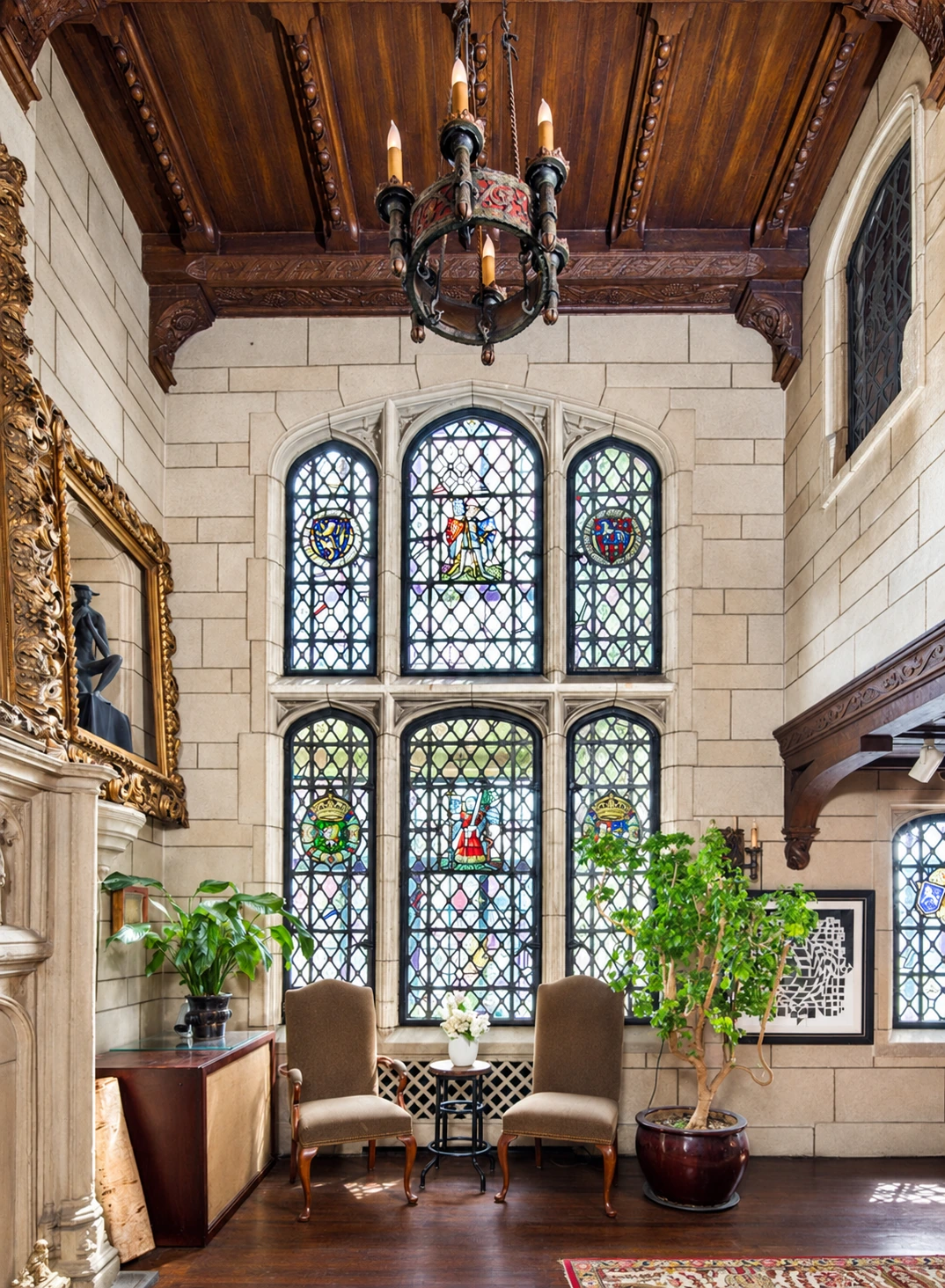 Stained-glass figures, a carved timber ceiling and chandelier in the Aranyi–Llorente apartment.