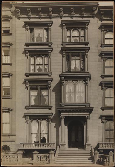 The brownstone at 131 East 21st Street in 1895, with its columned entrance, broad stoop and ornate window surrounds.