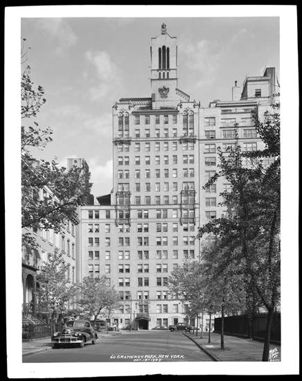 A 1943 black and white street photograph looking north toward the full facade of 60 Gramercy Park North.