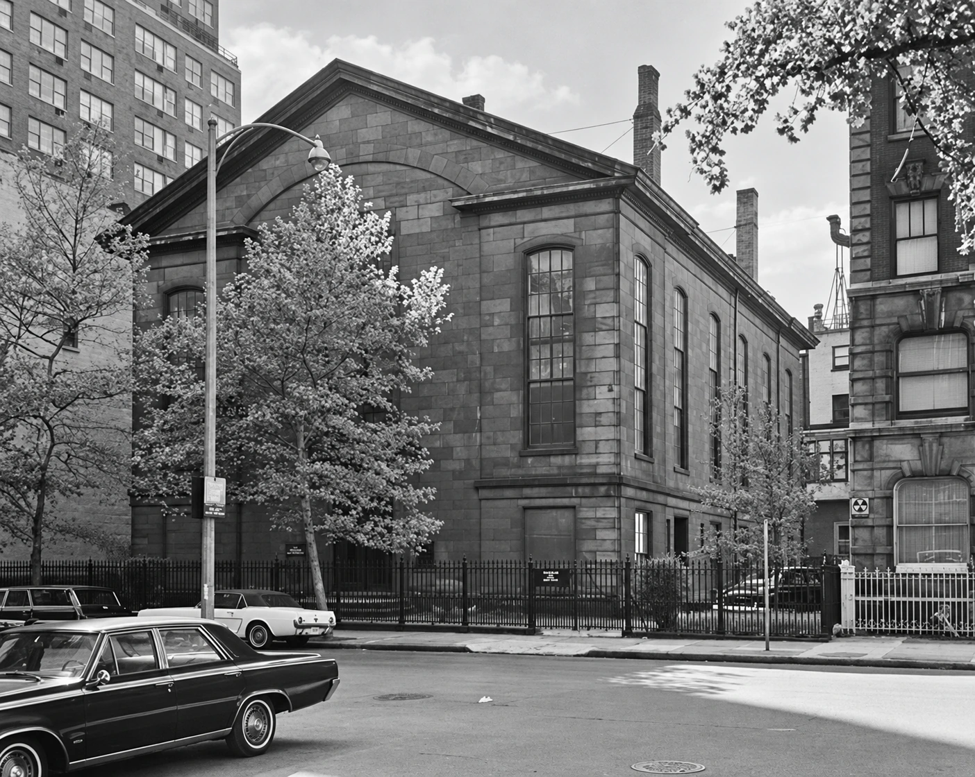 The Friends Meeting House facade and neighboring buildings in 1965.