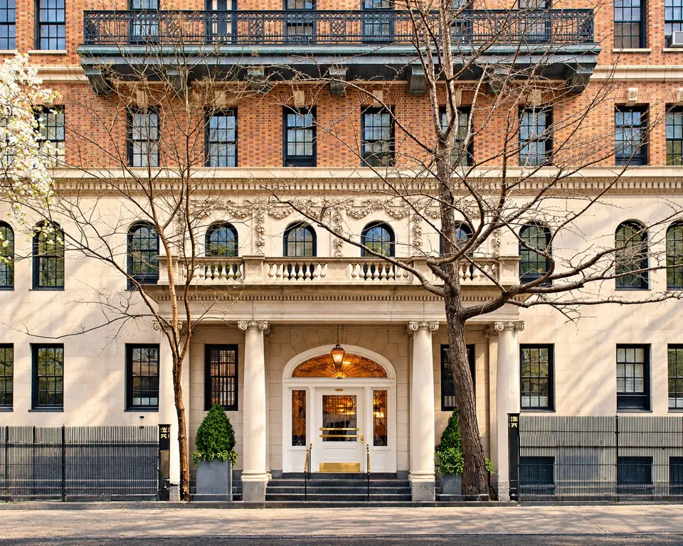 One Lexington Avenue’s entrance, framed by stone columns beneath a balustrade