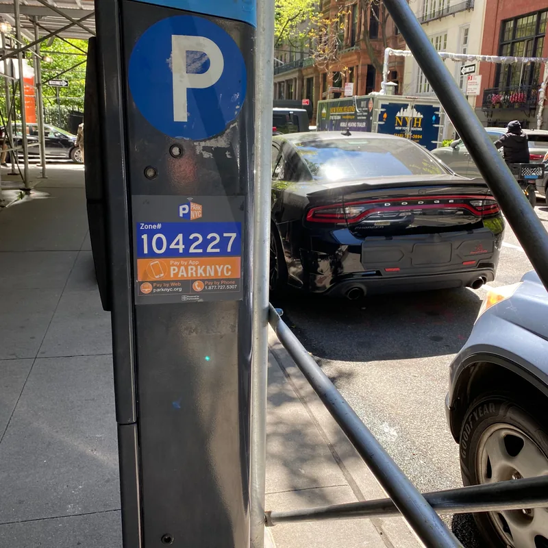 Parking meter 104227 cleaned beside the scaffolding.