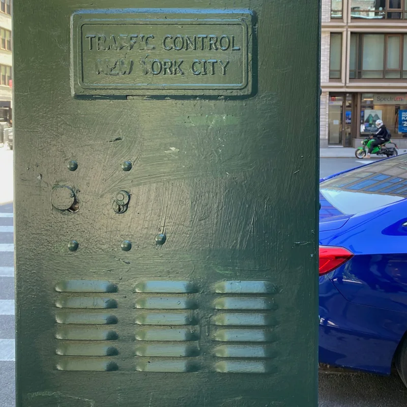 The traffic control cabinet repainted green.