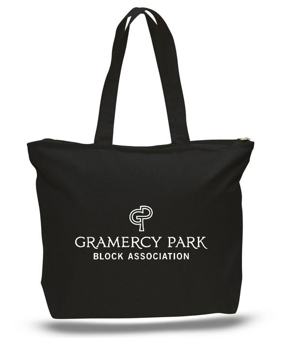 A black zippered tote displays the Block Association mark and name in white.