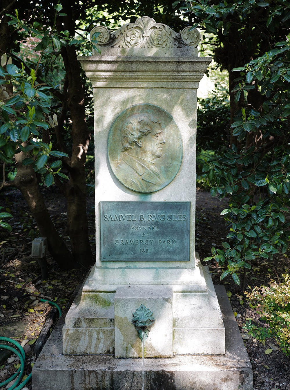 The Ruggles memorial fountain and its dedication plaque.