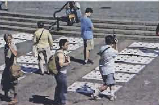 Visitors at the Honor the Fallen memorial in the September 2004 report.