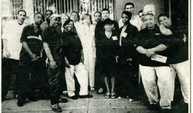 Kenmore Hall staff gather outside the building.