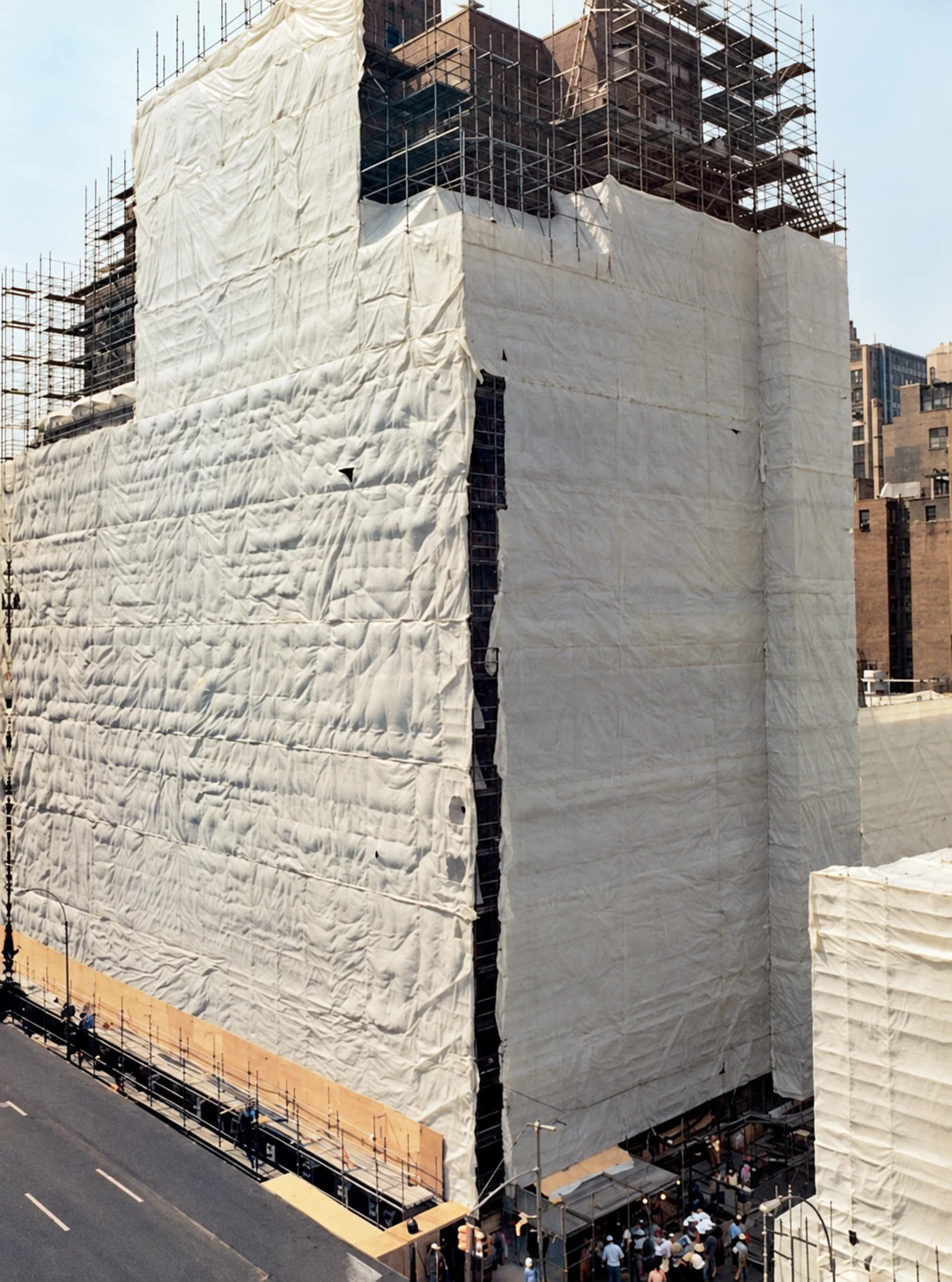 Scaffolding and white containment sheeting enclose 32 Gramercy Park South during the cleanup.