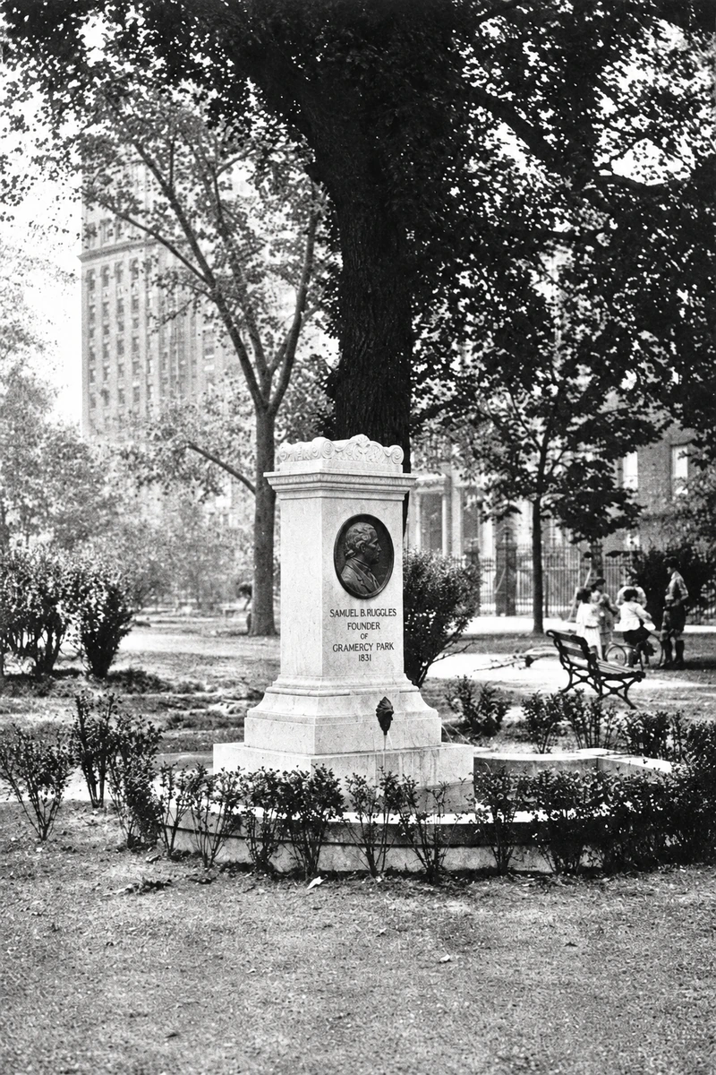 The Ruggles Fountain by 1921, with its oval portrait, curved basin and neighbors on the path behind it.