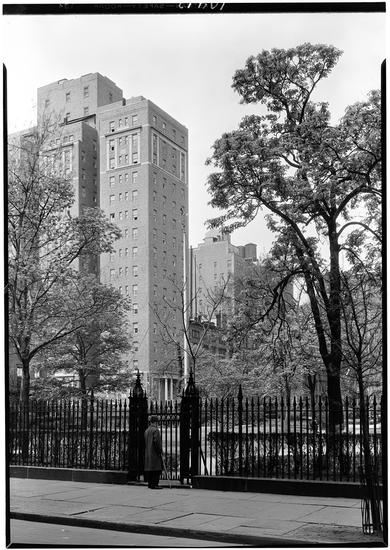 The iron fence, trees and 18 Gramercy Park South, photographed by Samuel H. Gottscho in 1929.