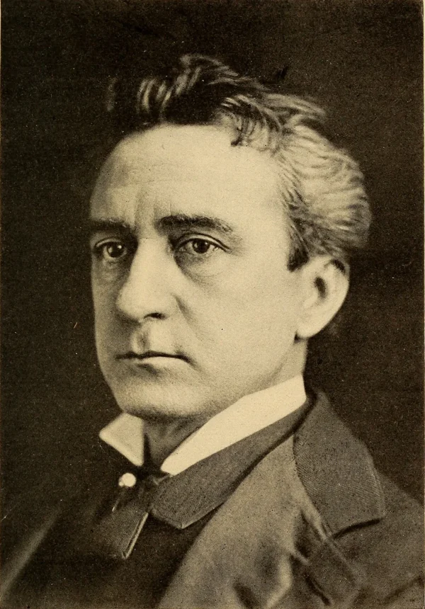Edwin Booth in a dark suit, his face turned slightly to the left.