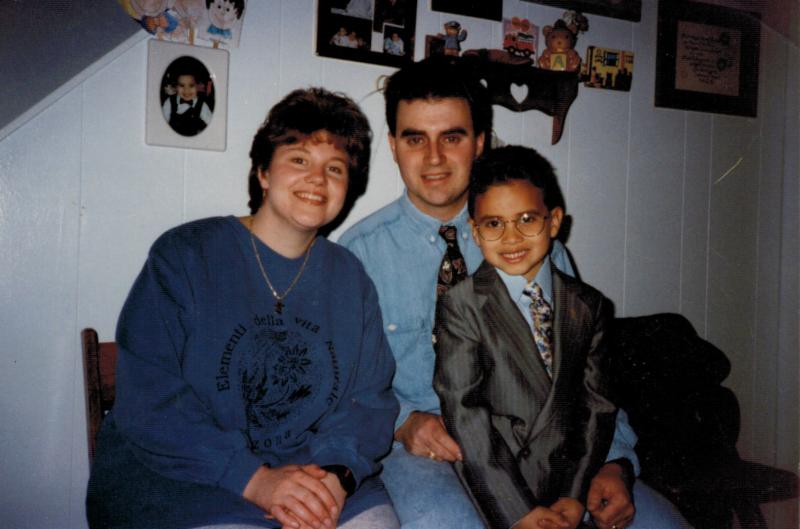 Police Officer Anthony Sanchez with his wife, Elizabeth, and their son, John.