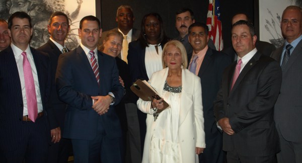 Arlene Harrison stands with a group of Manhattan South detectives.