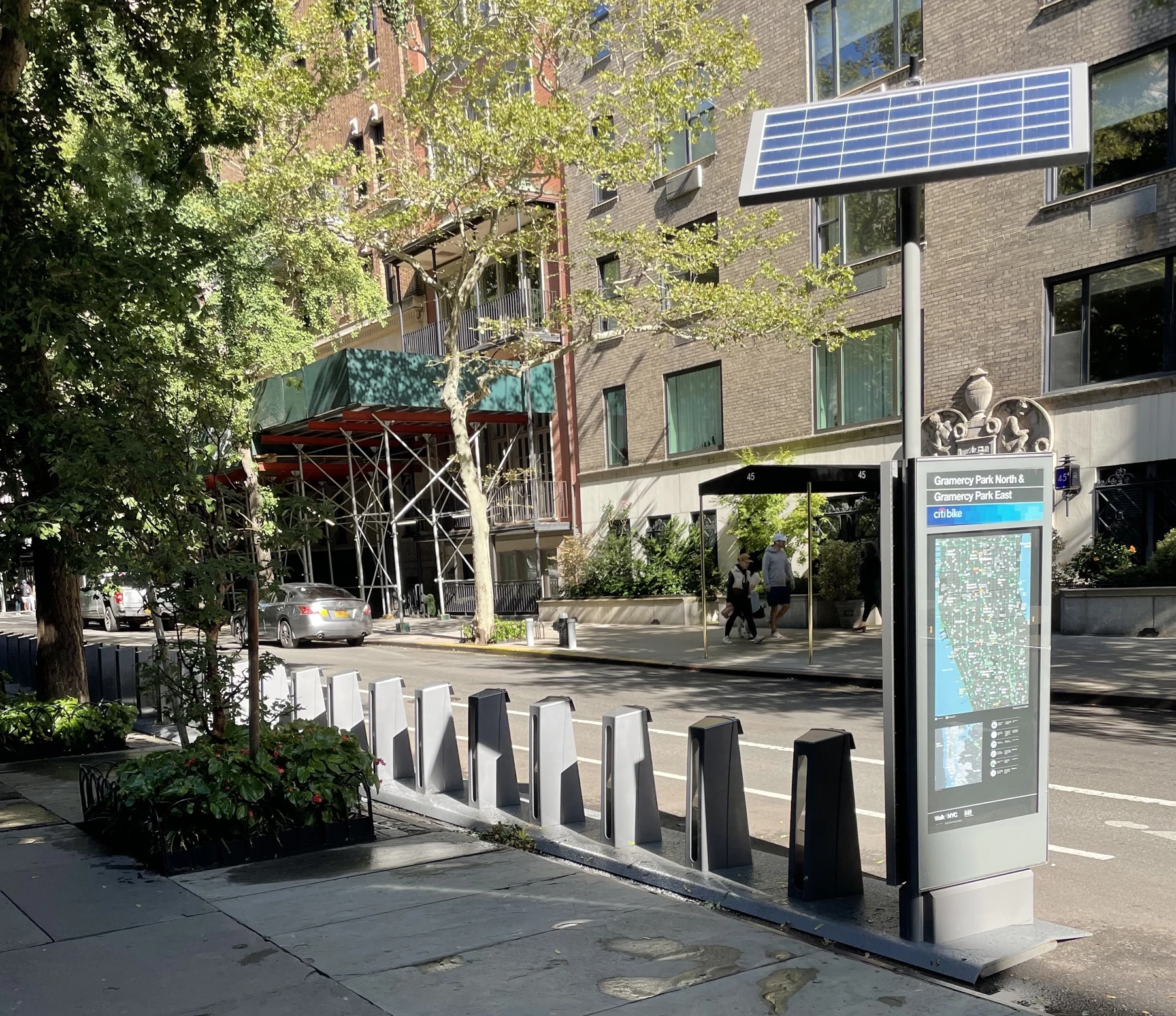 A Citi Bike dock and kiosk beside Gramercy Park North.