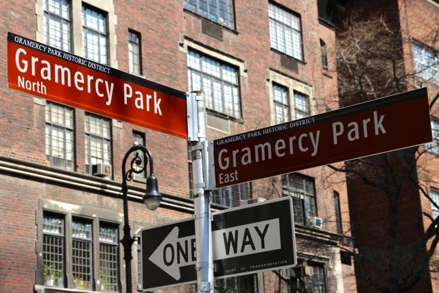 A brown Gramercy Park North street sign with Historic District lettering.